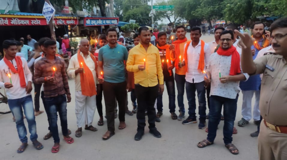 उदयपुर कांड में मृत व्यक्ति के आत्मा की शांति के लिए जलाया कैंडिल और रखा मौन 